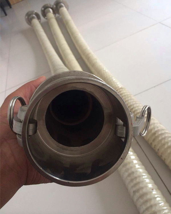 A food grade rubber hose with a quick coupling connector