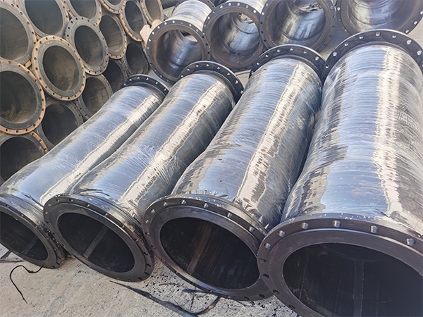 Four mud rubber hoses with flanges at both ends